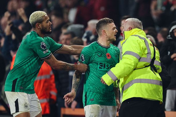 Kieran Trippier held back by Joelinton after angry clash with Newcastle fan at Bournemouth