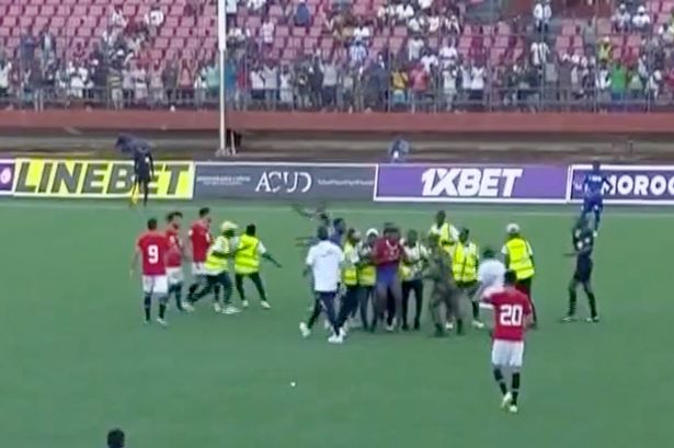 Liverpool star Mo Salah targeted and punches thrown as pitch invaders storm Egypt match