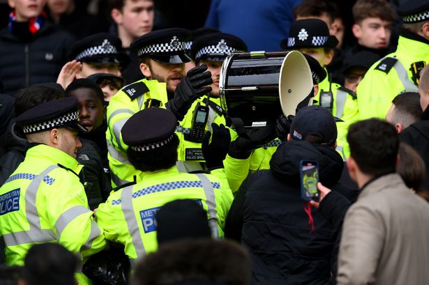 Police stormed Arsenal away end and clashed with Palace fans before confiscating drum