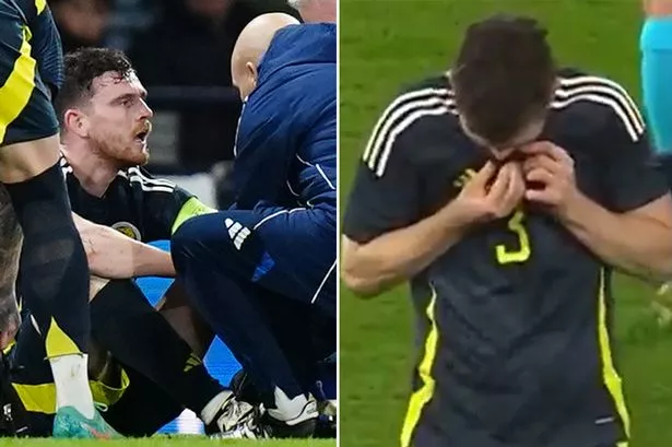Andy Robertson wipes eyes as he’s injured for Scotland – with Liverpool fans fearing worst