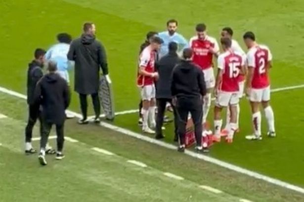 Cheeky Man City star caught eavesdropping on Arsenal team talk in unseen footage