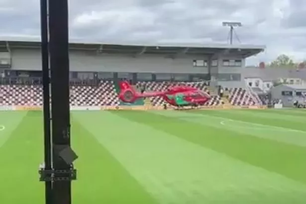 EFL clash stopped as fan falls ill and air ambulance lands on pitch