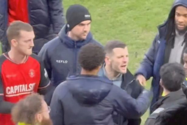 Ex-Arsenal star Jack Wilshere dragged away after clash with angry fans