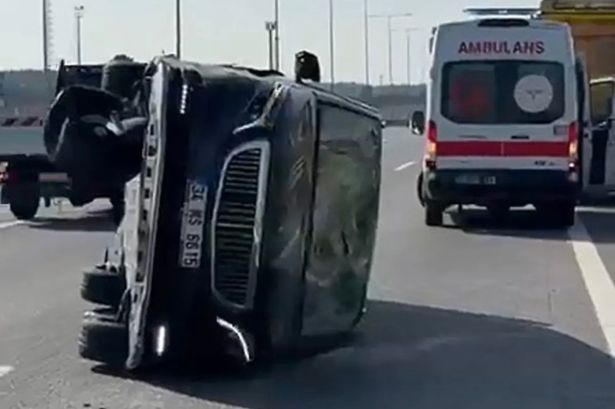 Wife of Premier League icon rushed to hospital as car flips over on way to children’s school