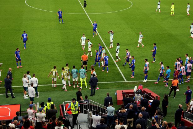 World Cup game stopped as fans explode with bottles hurled on pitch at referee