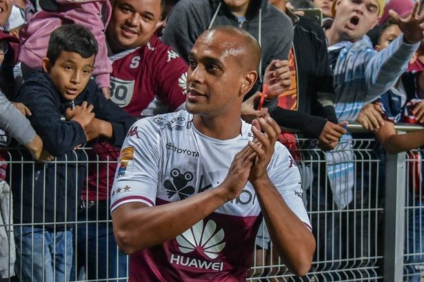Ex-footballer, 41, killed as wall collapses during storm with five people dead